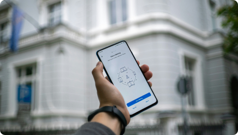 Photo of person holding smartphone.