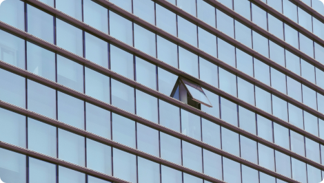 Photo of building with opened window.